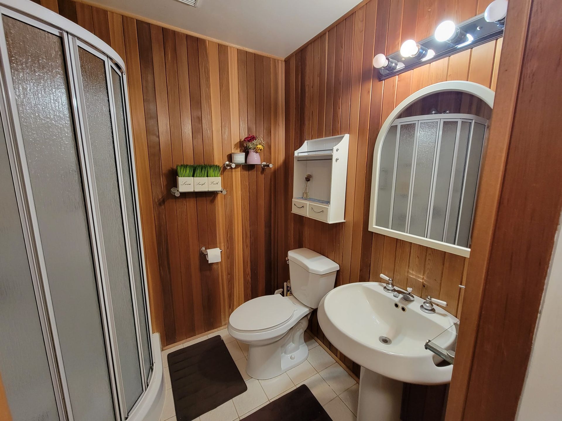 Bathroom vanity and mirror detail, Laura Cooper Realtor Toronto real estate