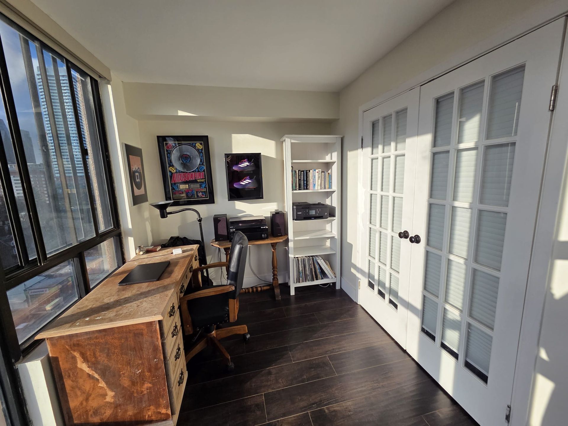 Den detail with natural light and vinyl flooring, featured by Laura Cooper Realtor