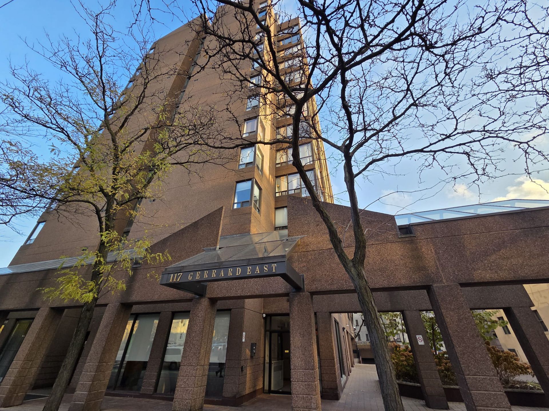 Exterior view of TO Condominiums at 117 Gerrard Street East, listed by Laura Cooper Realtor