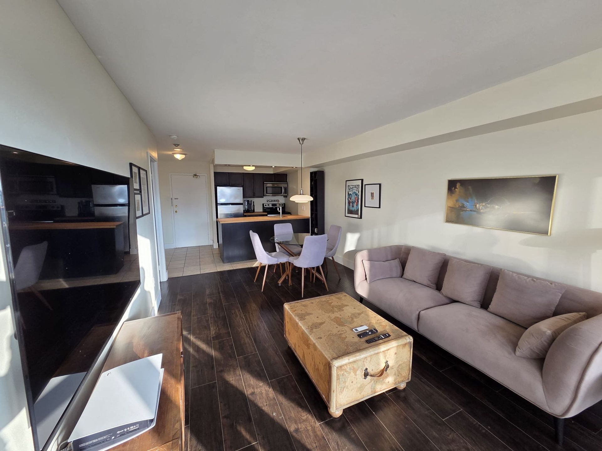 Living and dining area, kitchen,vinyl floors, Laura Cooper Realtor Toronto listing