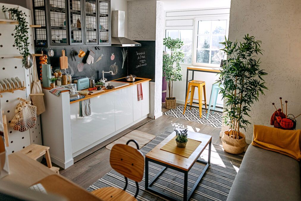 Bright small living room staged with natural light
Mirror used to create the illusion