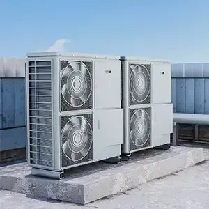 Outdoor HVAC units on a rooftop, light gray metal with large fans and a blue sky background
