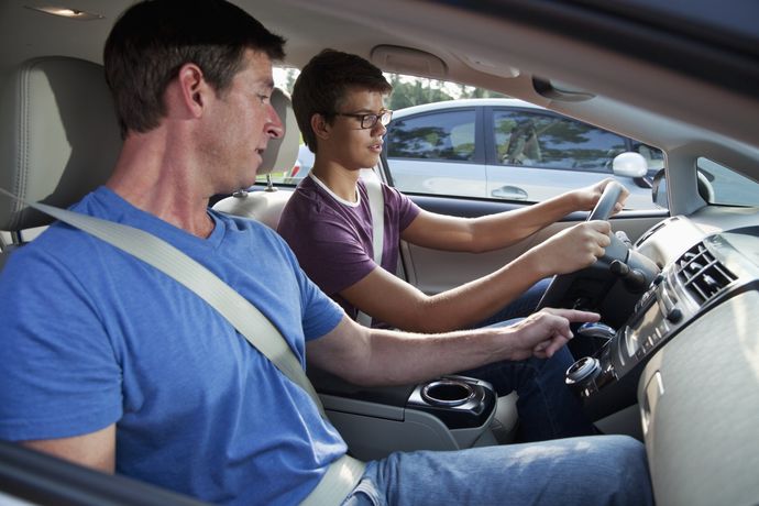 Man Teaching Girl How to Drive — Colorado Springs, CO — Academy School of Driving, LLC Man Teaching Girl How to Drive — Colorado Springs, CO — Academy School of Driving, LLC