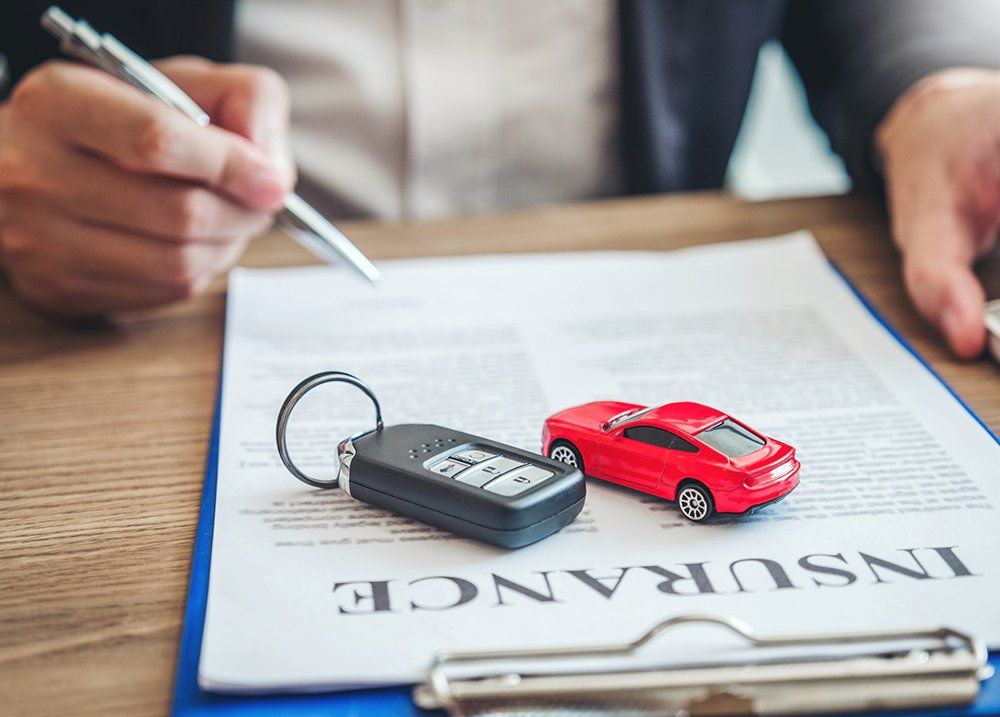 Signing Insurance Contract — Chicago, IL — Metropolitan Insurance Service Consultants, Inc Signing Insurance Contract — Chicago, IL — Metropolitan Insurance Service Consultants, Inc