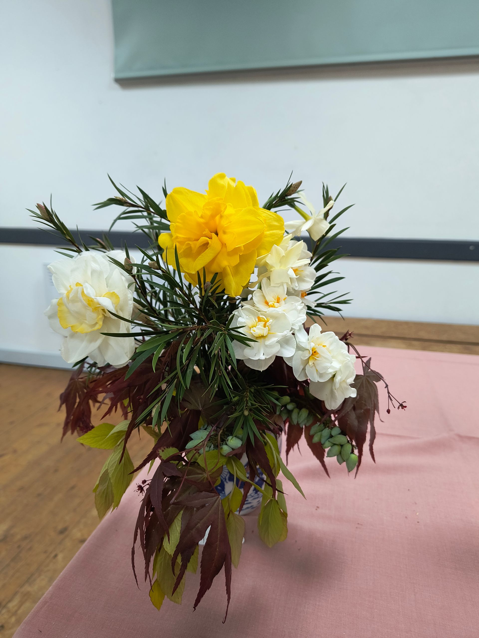 a mix of narcissi and foliage