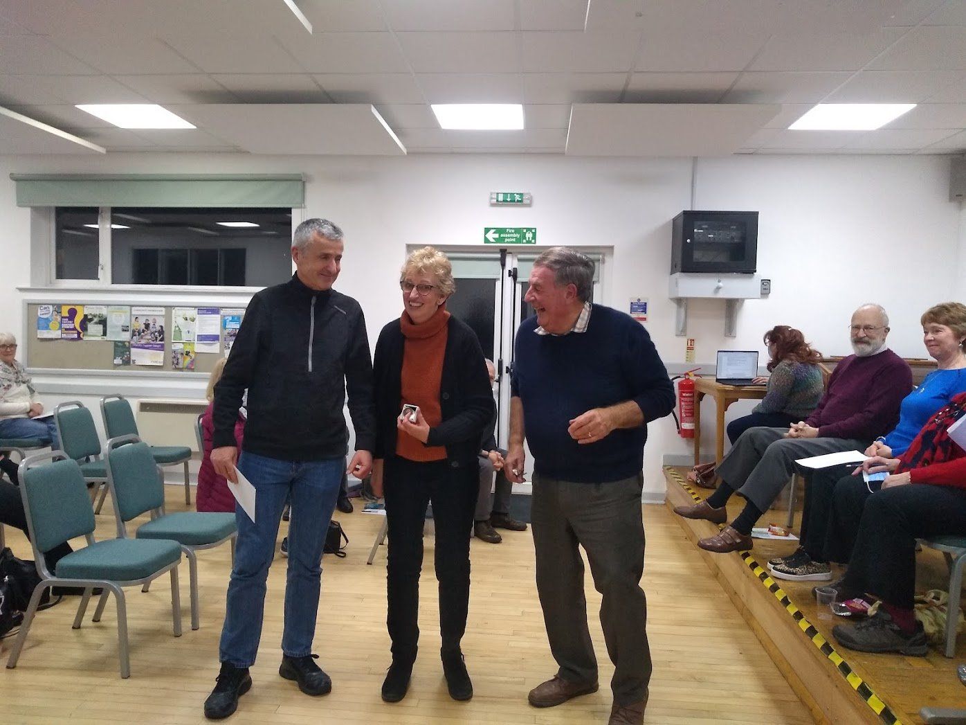Photo of Rob and Jo Bocutt receiving the Banksian Medal from Chair Glenn Duggan