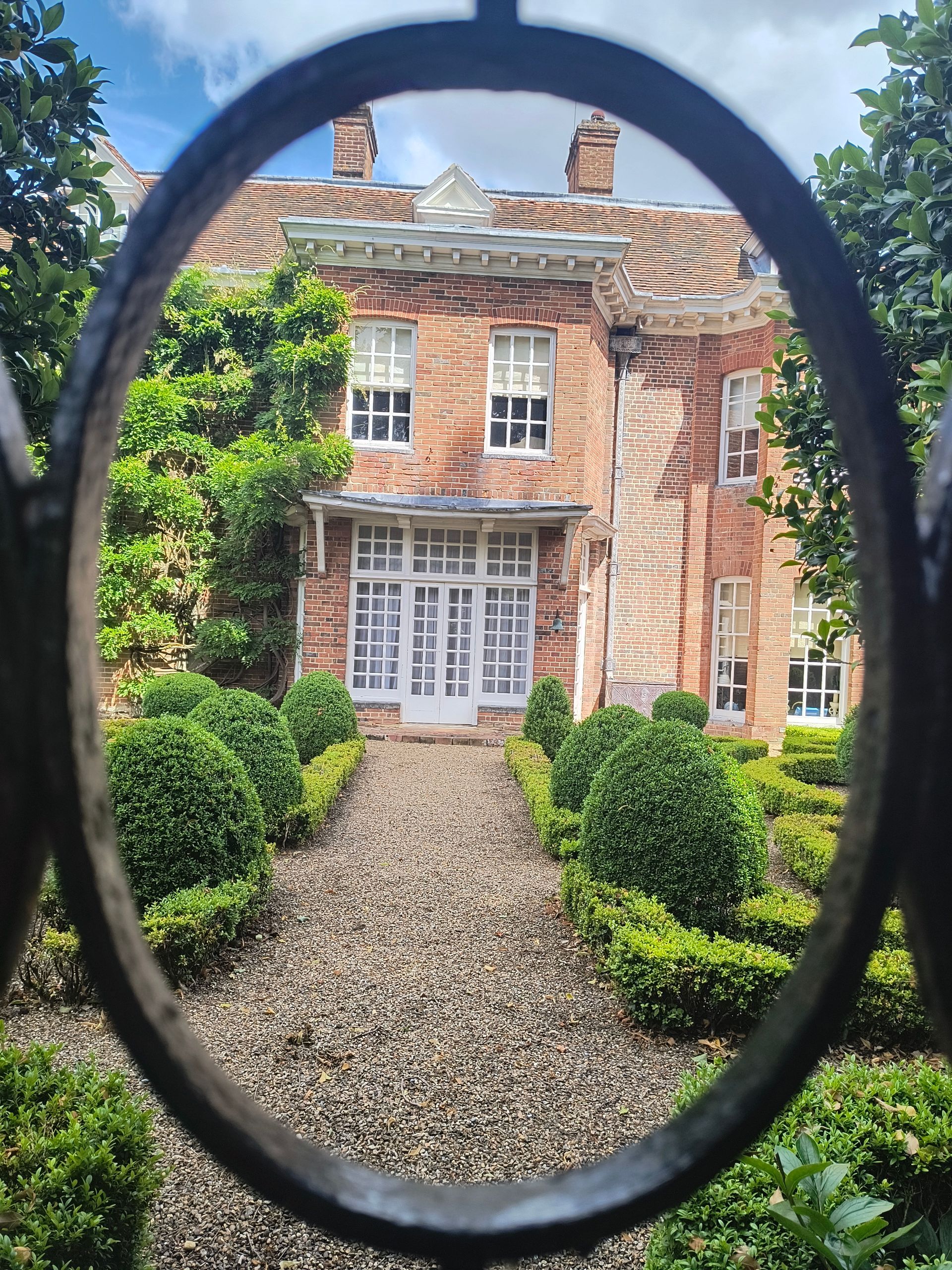 Photo of West Green house taken through the gateway.  The house is not open to the public.