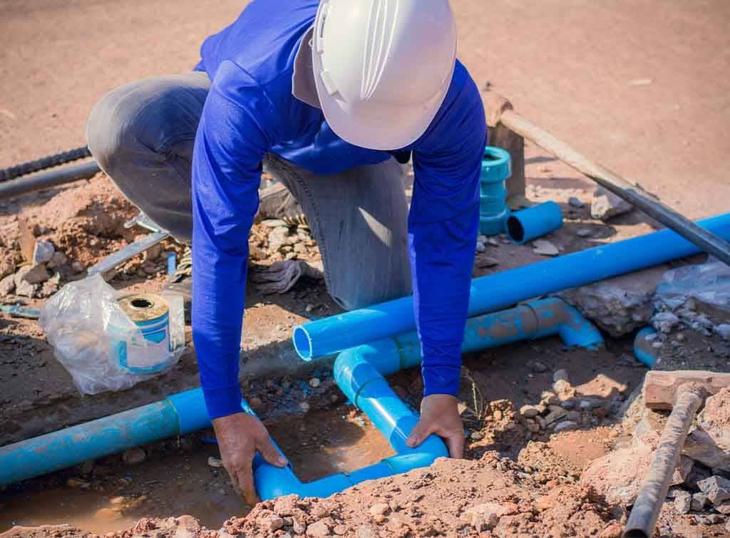 Water Line Repairs plumber fixing water pipes