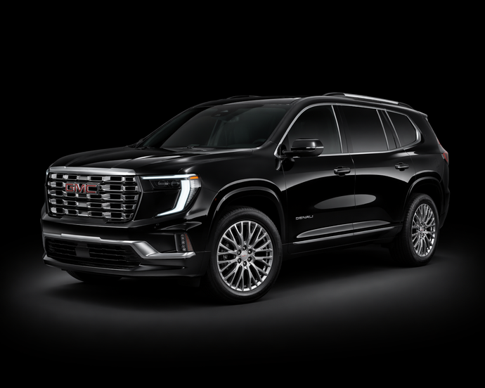 A black gmc yukon is shown on a white background.