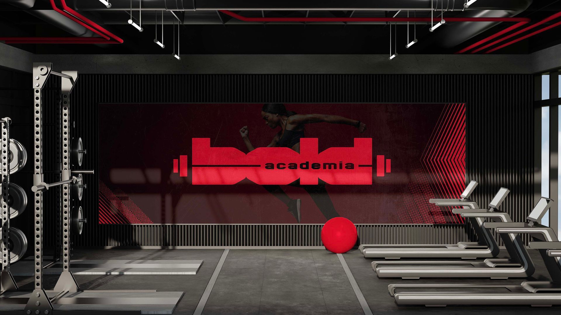 Interior de academia moderna com detalhes em vermelho, aparelhos de musculação, bancos e um painel de fundo com o logotipo vermelho.