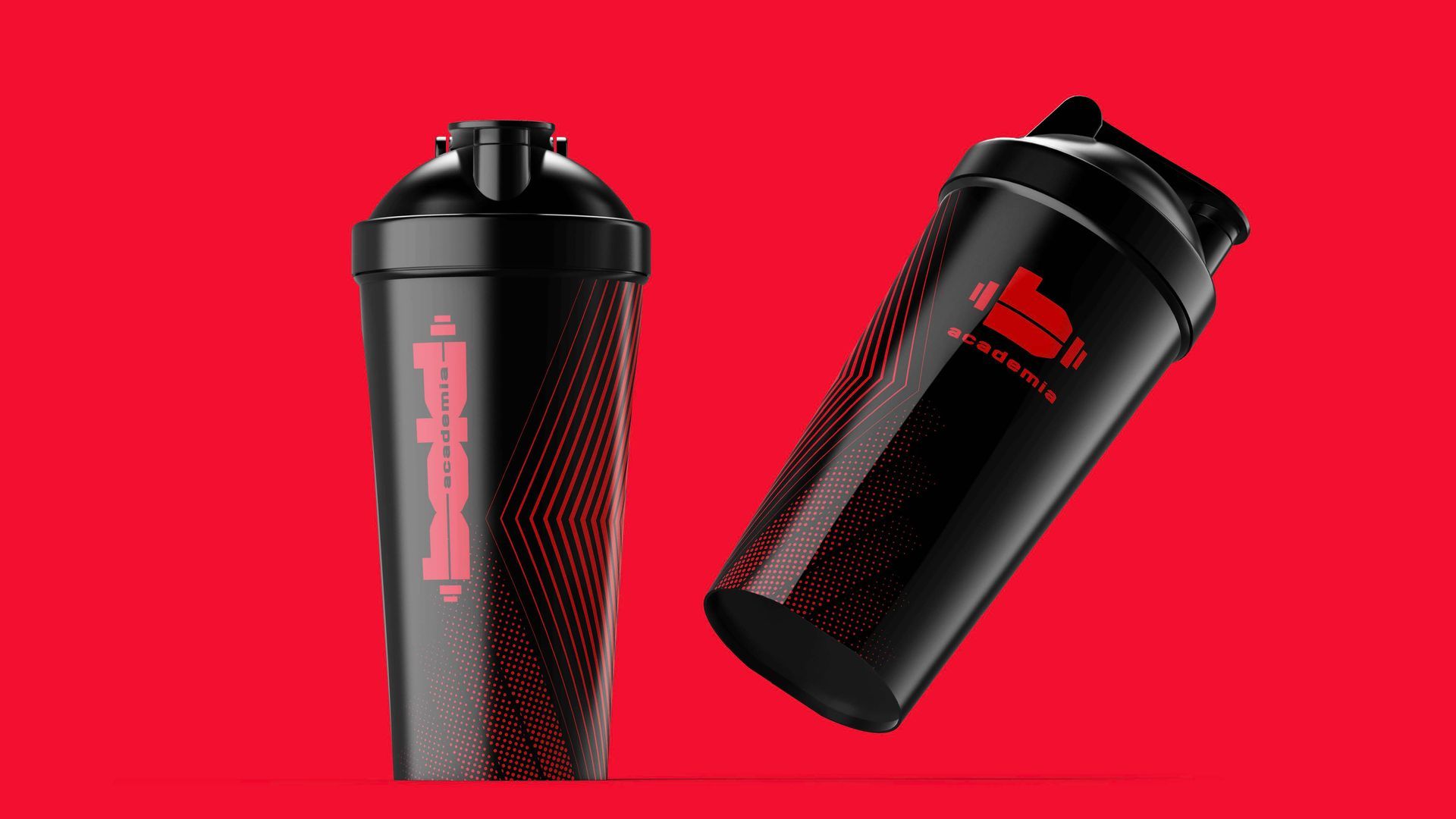 Duas garrafas shaker pretas com detalhes em vermelho sobre um fundo vermelho vivo.