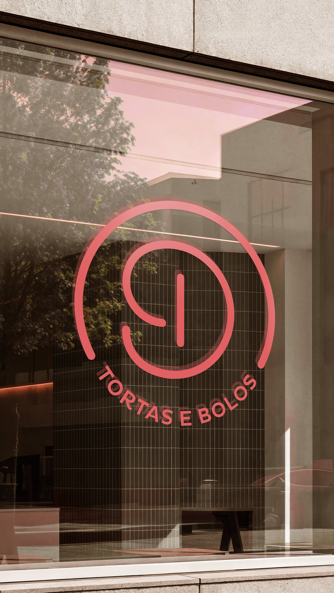 Pink logo on a glass storefront reading “TORTAS E BOLOS.”