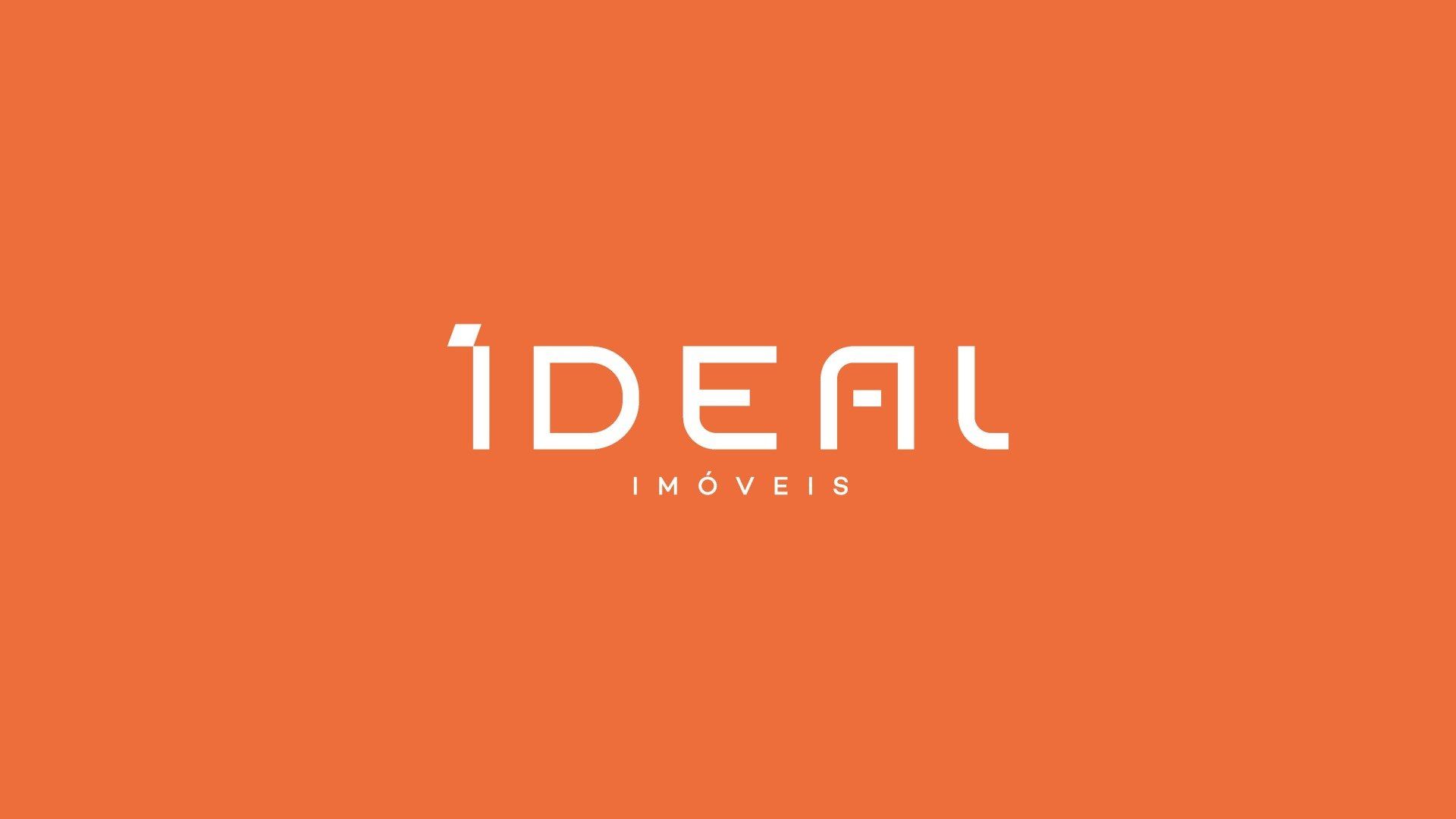 Um logotipo para uma empresa chamada ideal em um fundo laranja.