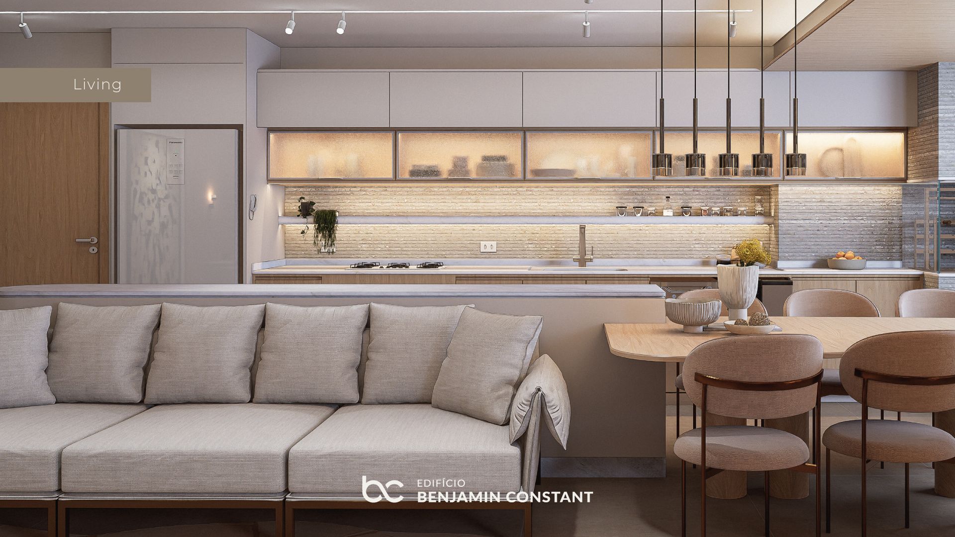 Cozinha e sala de estar modernas em conceito aberto, com sofá bege, iluminação aconchegante e mesa de jantar junto à ilha.