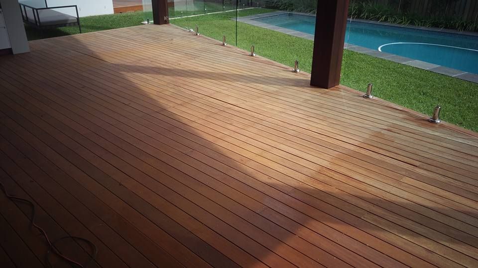 Wooden Deck With A Swimming Pool On The Side — Shane's Painting & Timber Restorations In Westbrook, QLD
