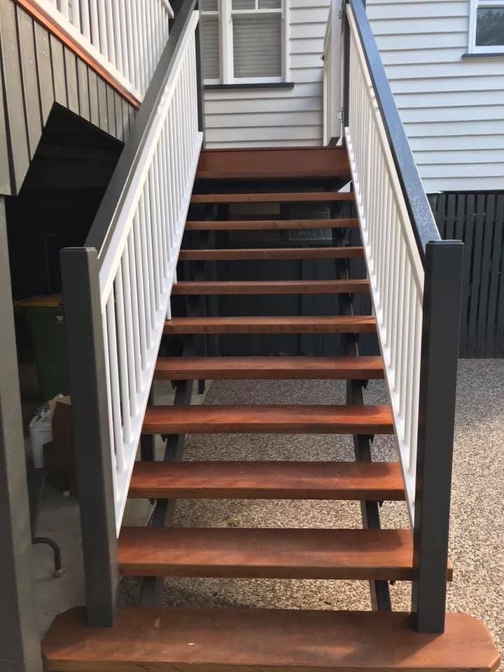 Set Of Wooden Stairs With A White Railing — Shane's Painting & Timber Restorations In East Toowoomba, QLD