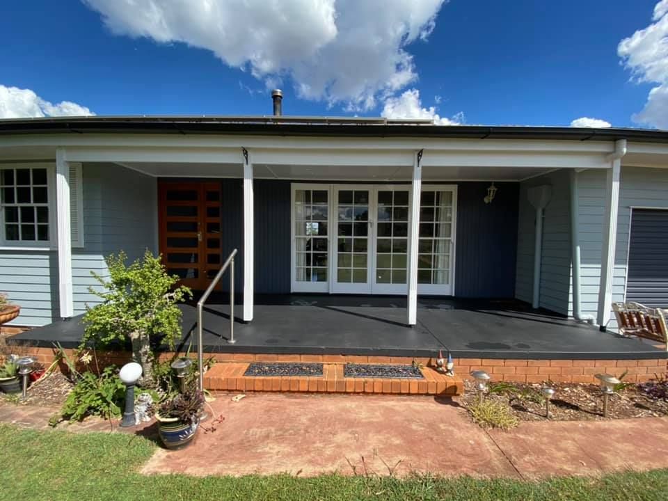 Front Of A House With A Porch And A Brick Walkway — Shane's Painting & Timber Restorations In Warwick, QLD