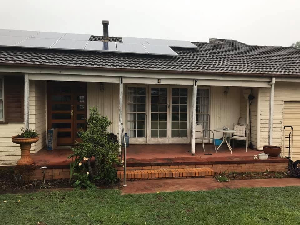 White House With A Porch And Solar Panels On The Roof — Shane's Painting & Timber Restorations In East Toowoomba, QLD