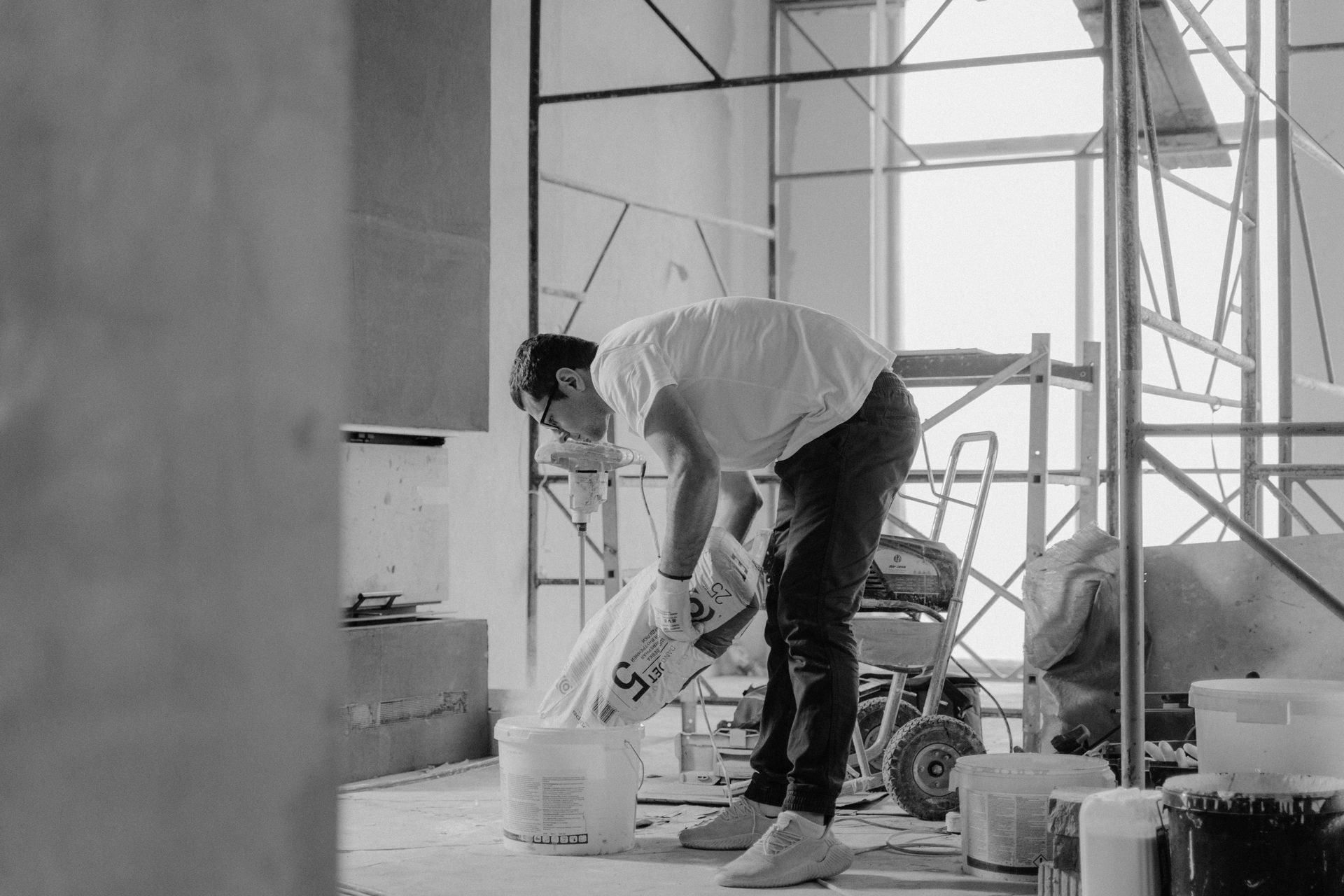 A professional remodeling a home for a client.