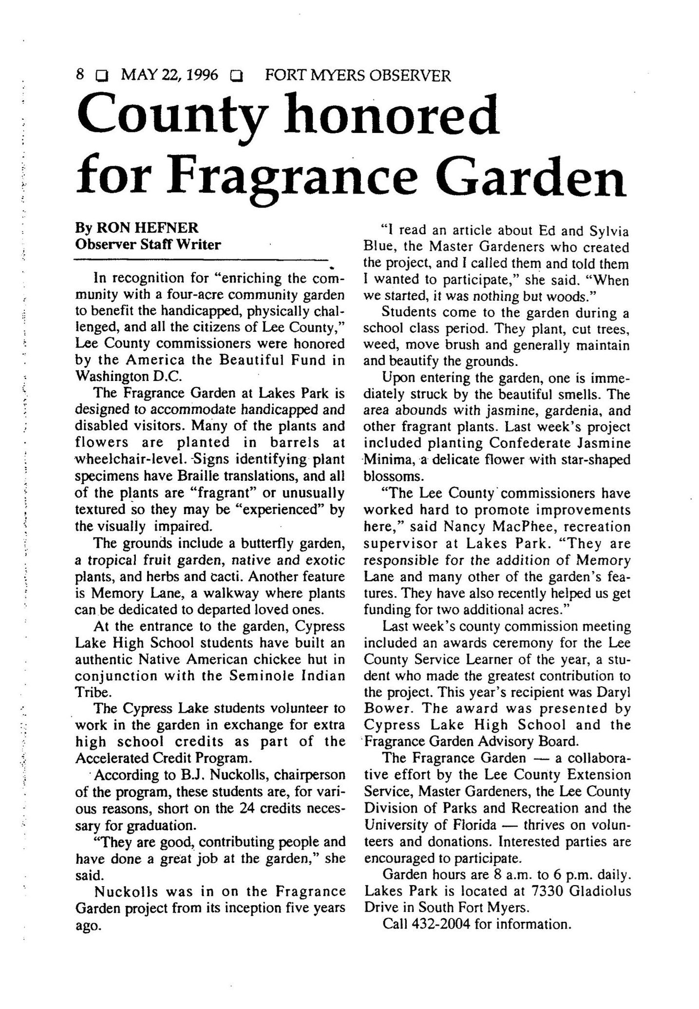 A newspaper article about a county honored for fragrance garden.