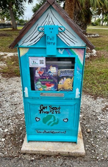 A blue box that says girl scout troop 241 on it