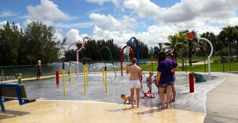 A group of people are playing in a water park.