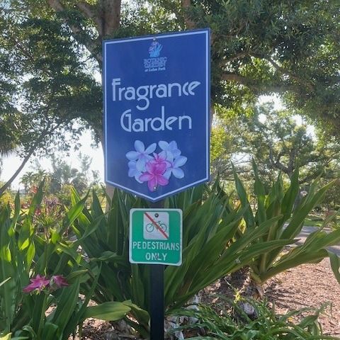 A sign that says fragrance garden on it