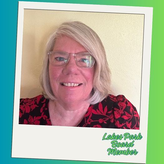 A woman wearing glasses and a floral shirt is a lakes park book member