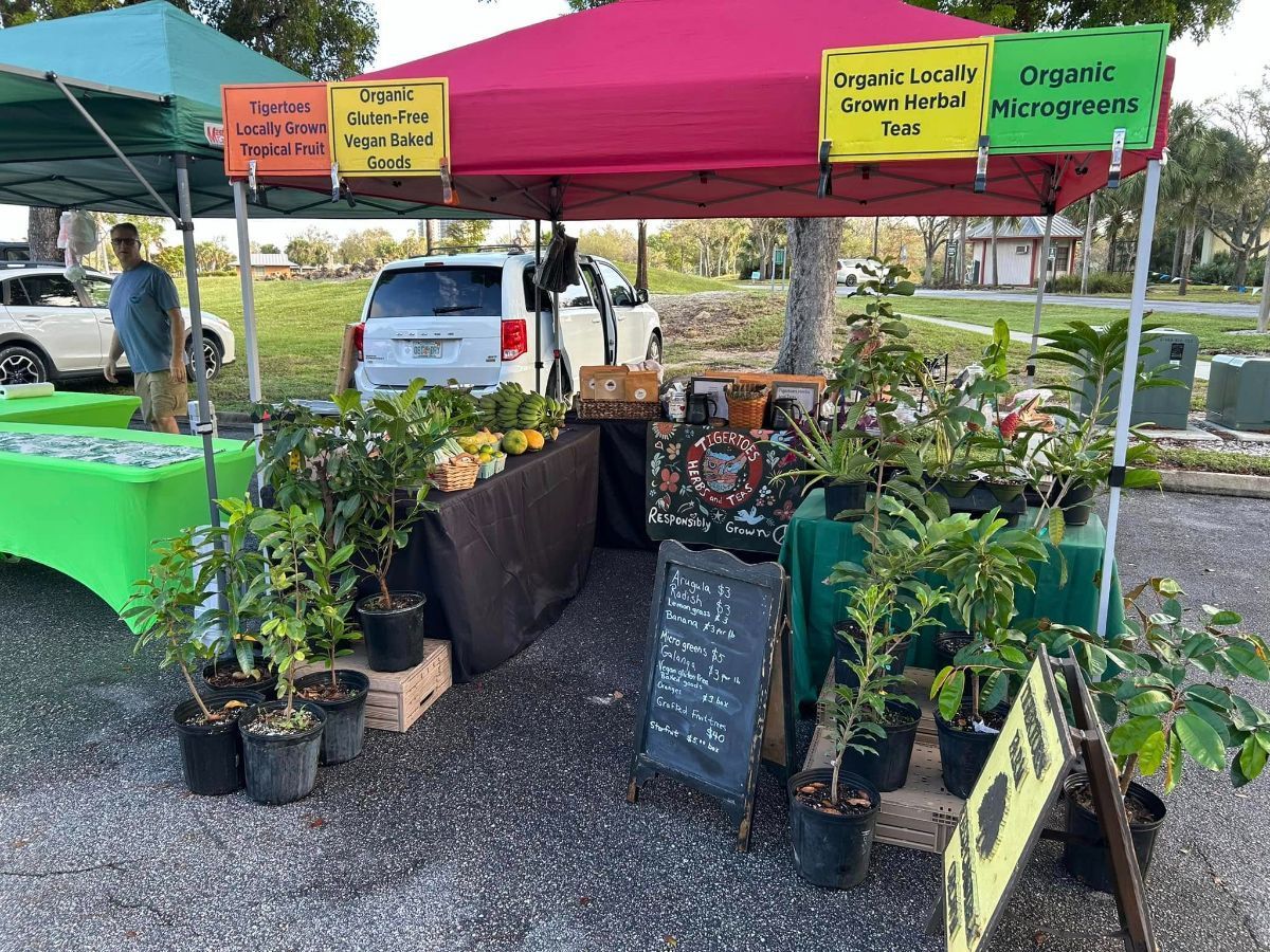 A tent with a sign that says organic hemp seeds on it