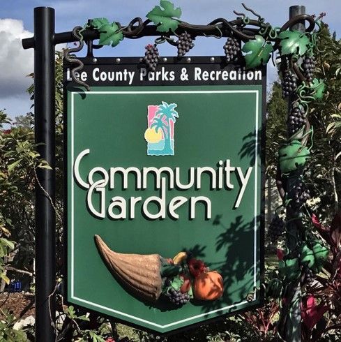 A sign for the county parks and recreation community garden