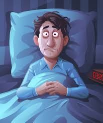 Man lying awake in bed with wide eyes; alarm clock shows 3:20 AM.