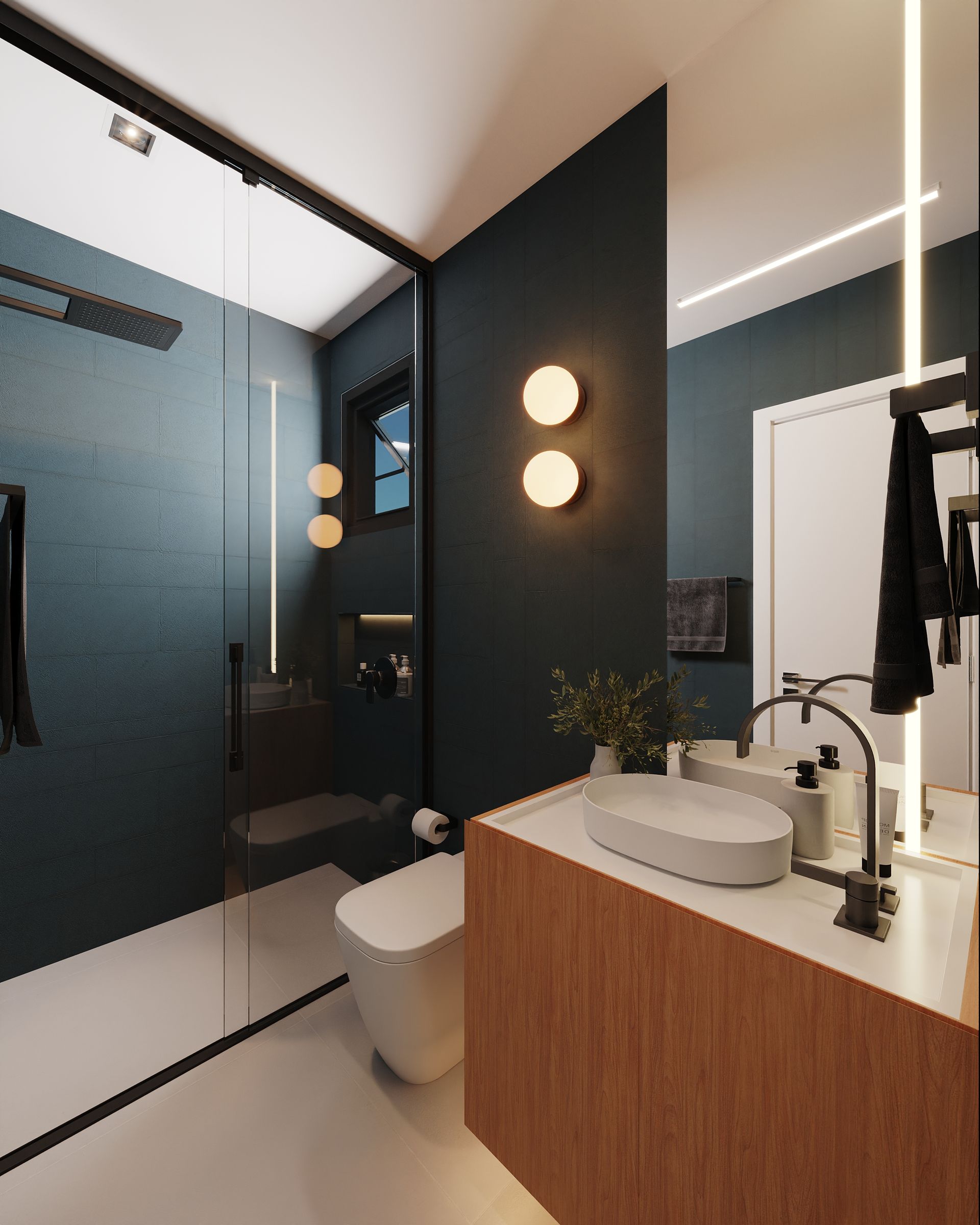 Um banheiro com vaso sanitário, pia, espelho e chuveiro.