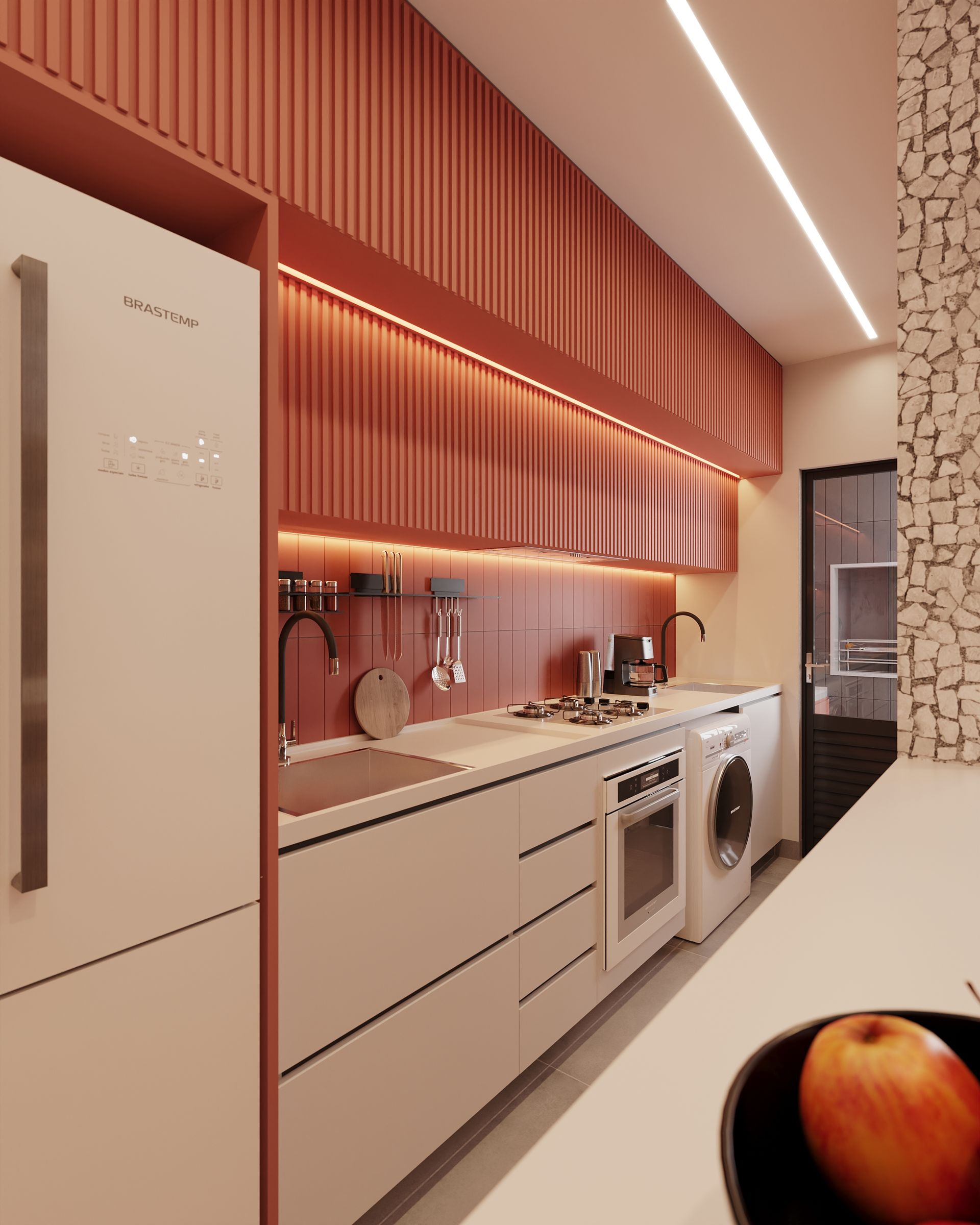 Uma cozinha com uma geladeira e uma tigela de maçãs