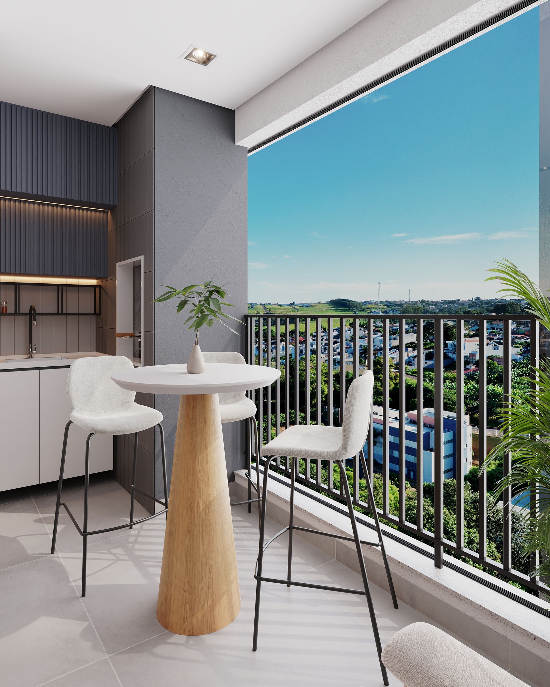 Uma varanda com mesa e cadeiras e vista para a cidade.