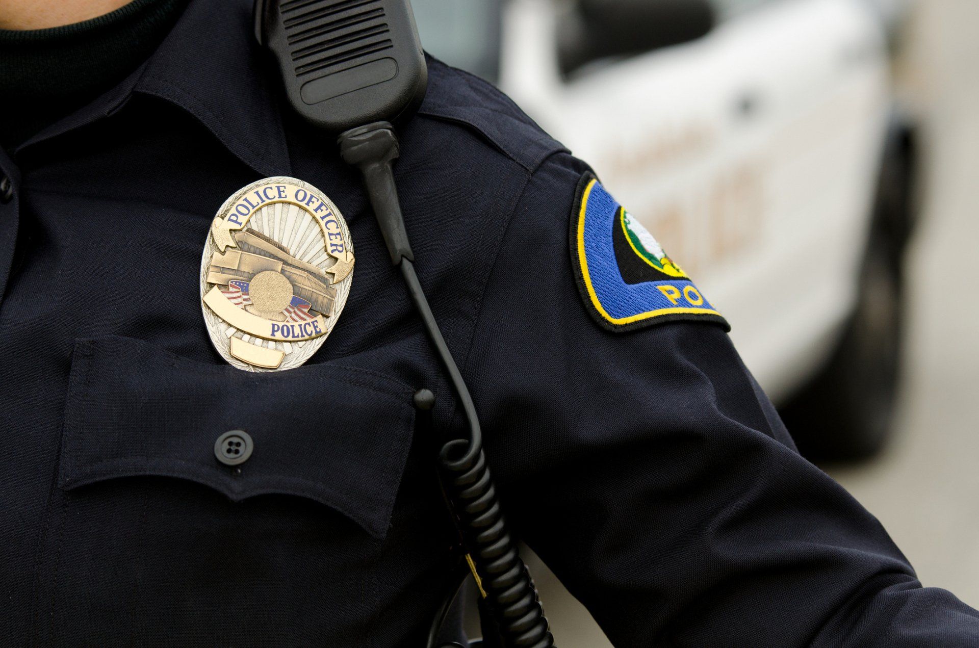 Cop with Radio — Burlington, VT —  Paul Jarvis Law