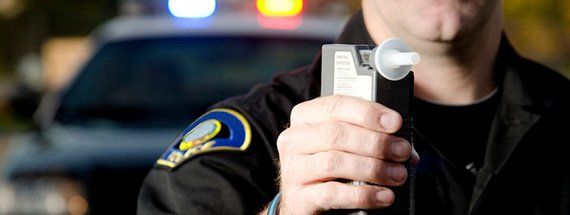 Cop Holding Breath Analyzer — Burlington, VT —  Paul Jarvis Law