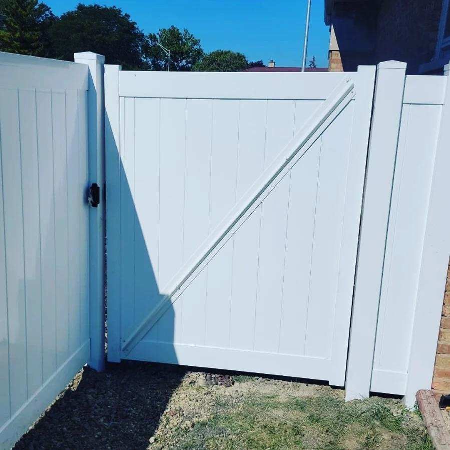 White Wood Door — Griffith, IN — Rojas Fencing & Decking