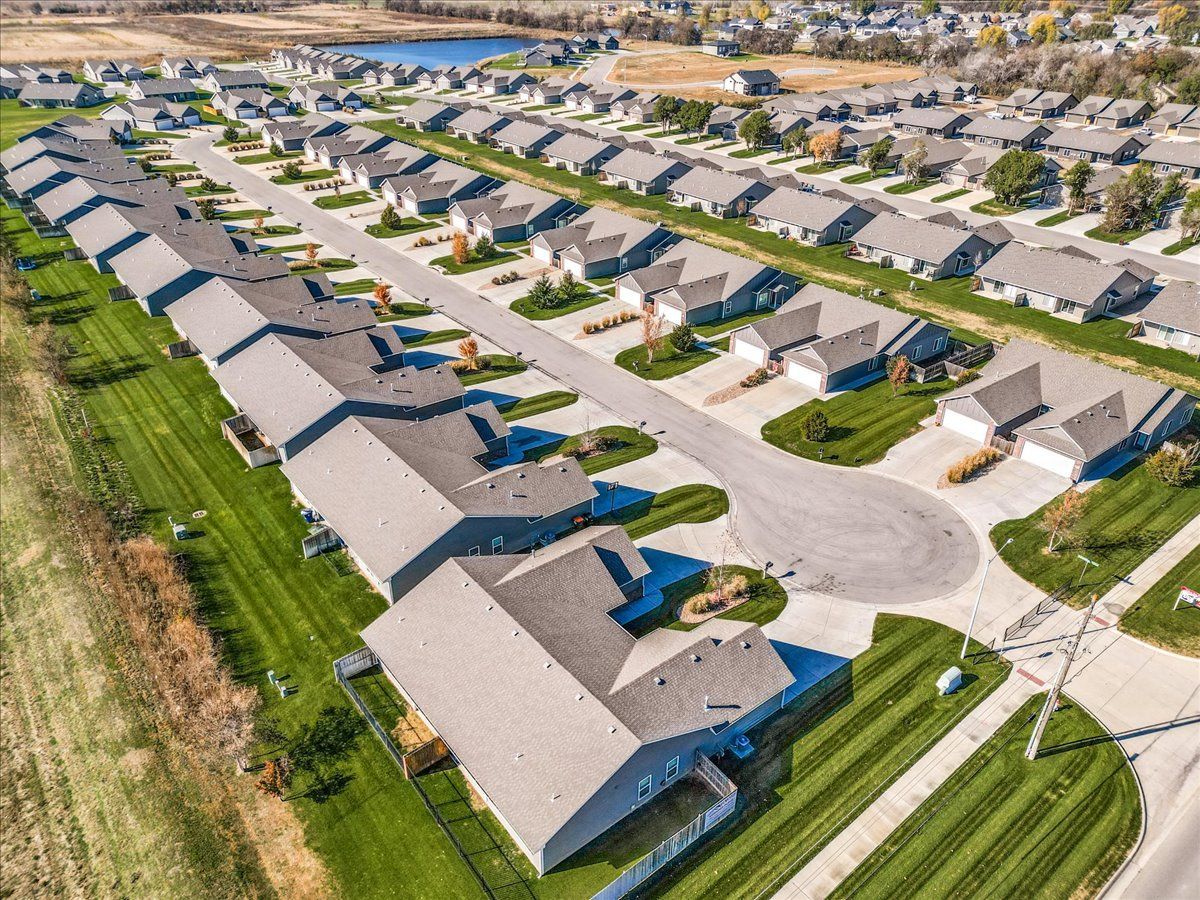 An aerial view of a residential neighborhood with lots of houses.
