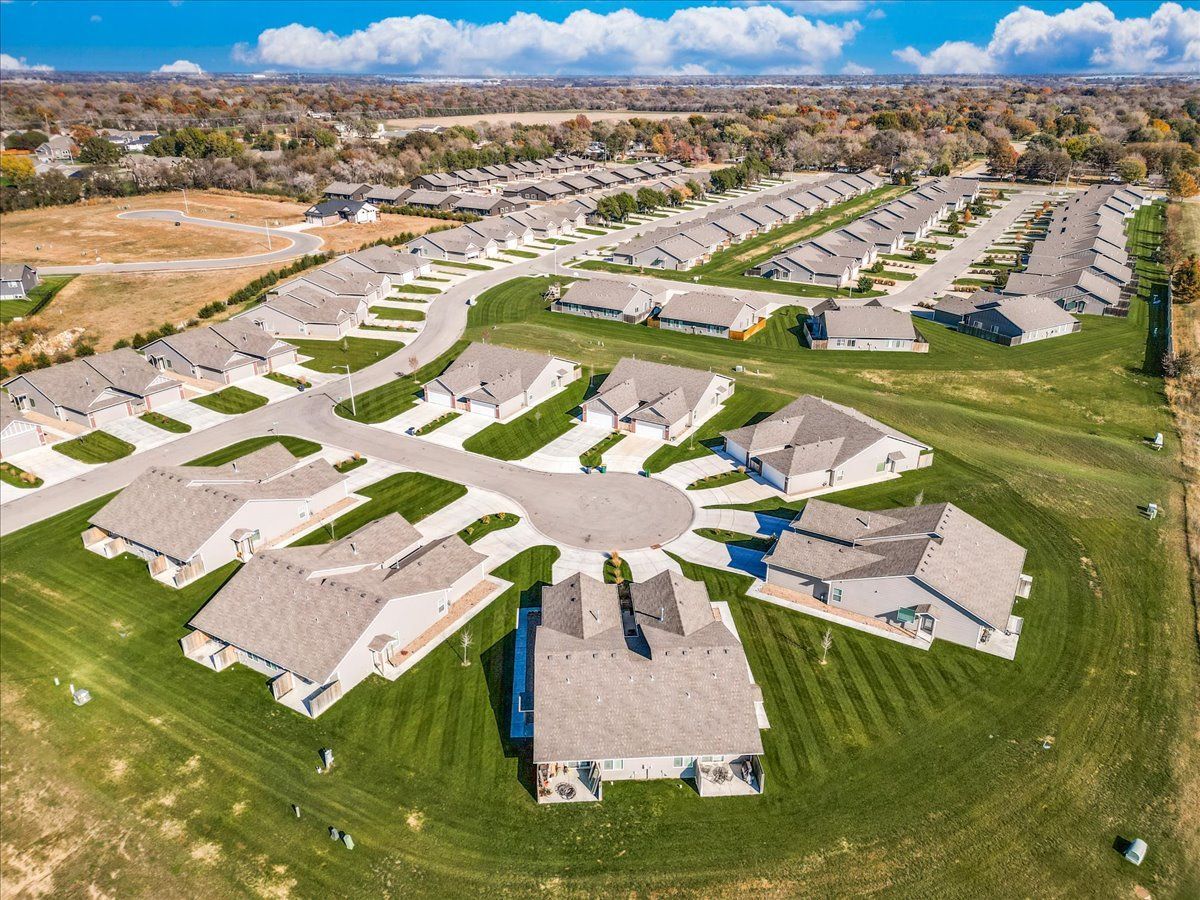 An aerial view of a residential neighborhood with lots of houses.