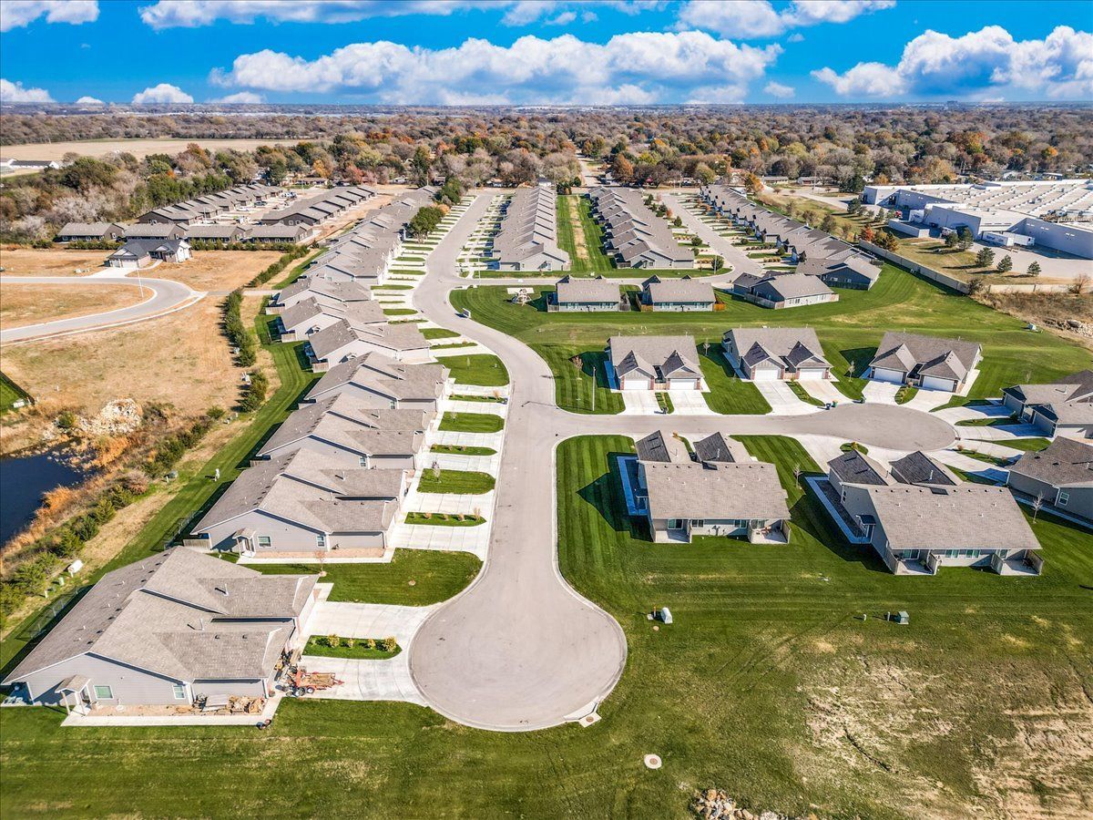 An aerial view of a residential neighborhood with lots of houses.