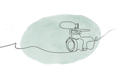 Sketch of a camcorder with a microphone on a pale green background, connected by a cable