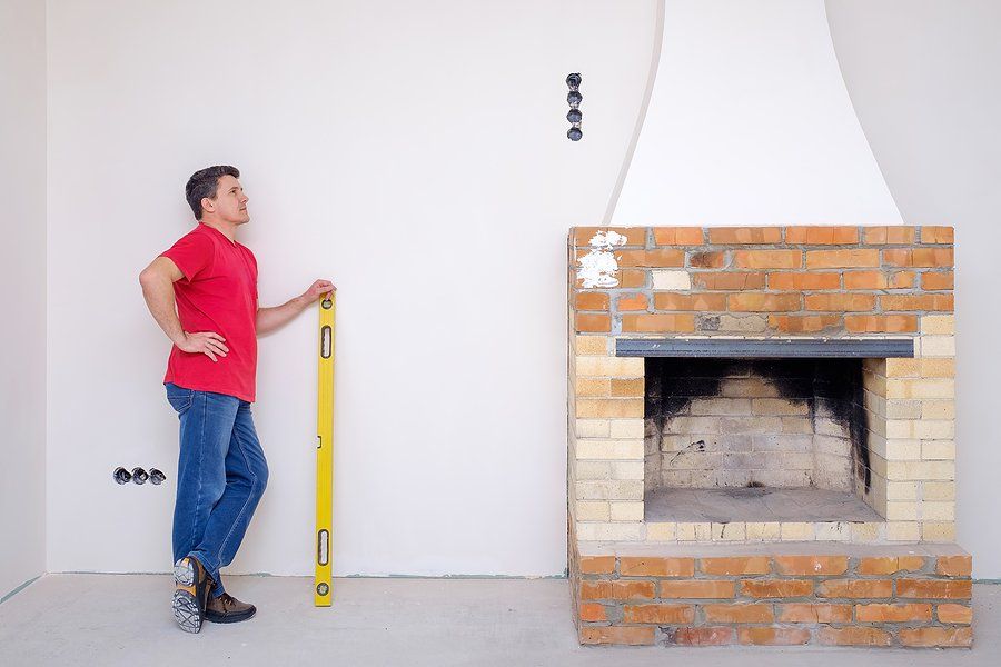 worker leaning on the wall