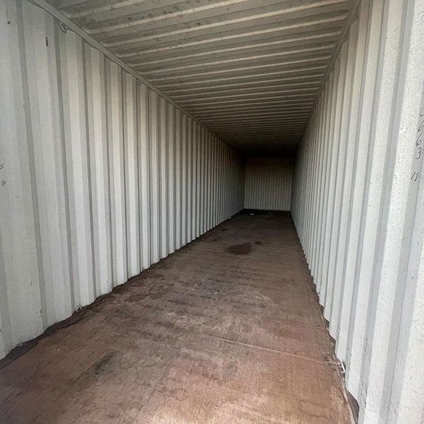 The inside of a shipping container is very long and narrow.