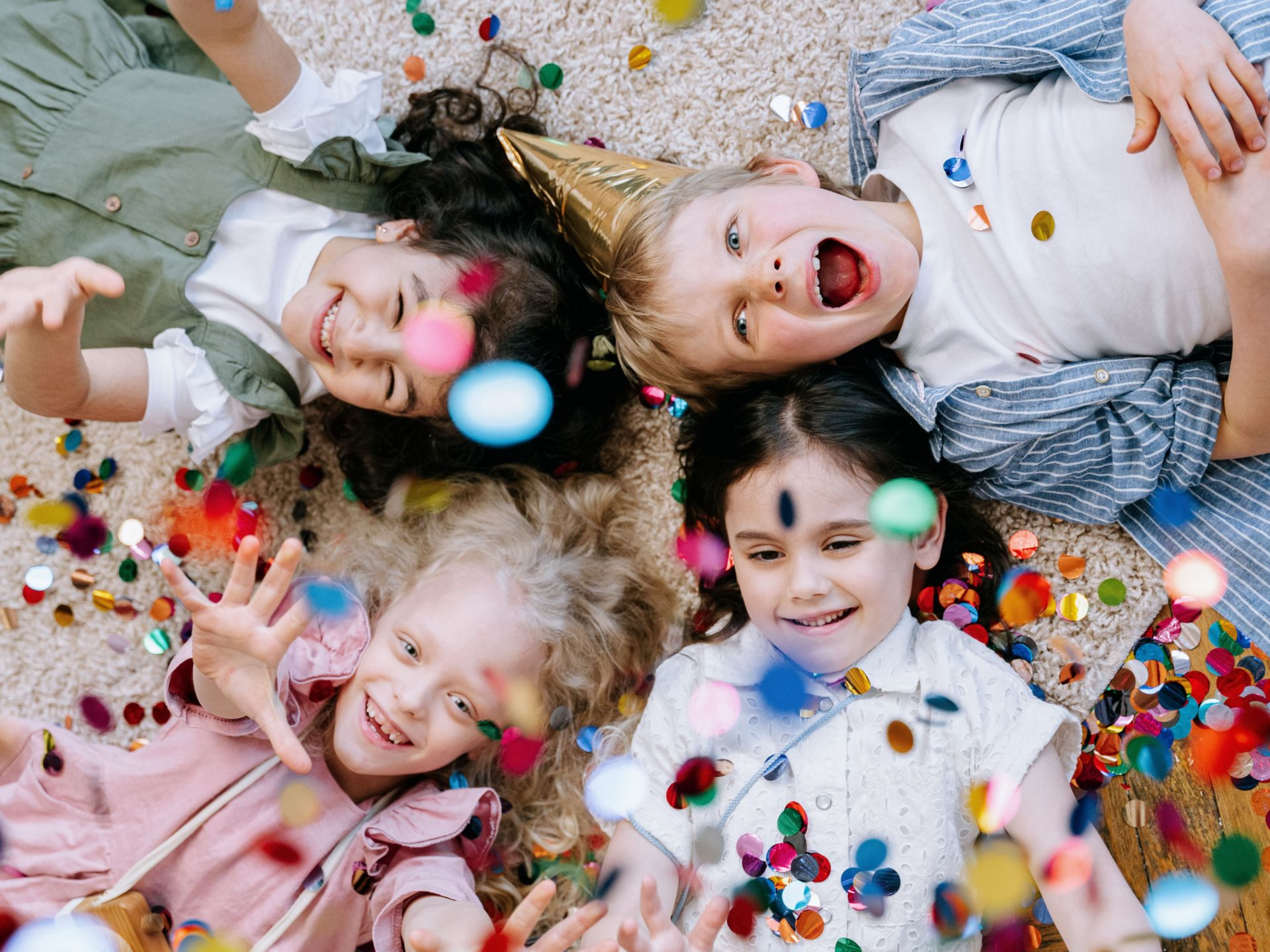 Kids under confetti
