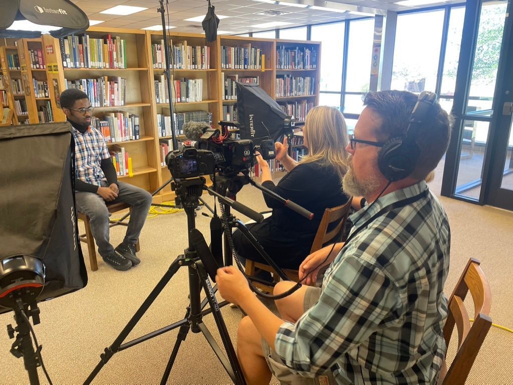 Video Crew interviewing deaf student at Southwest College for the Deaf