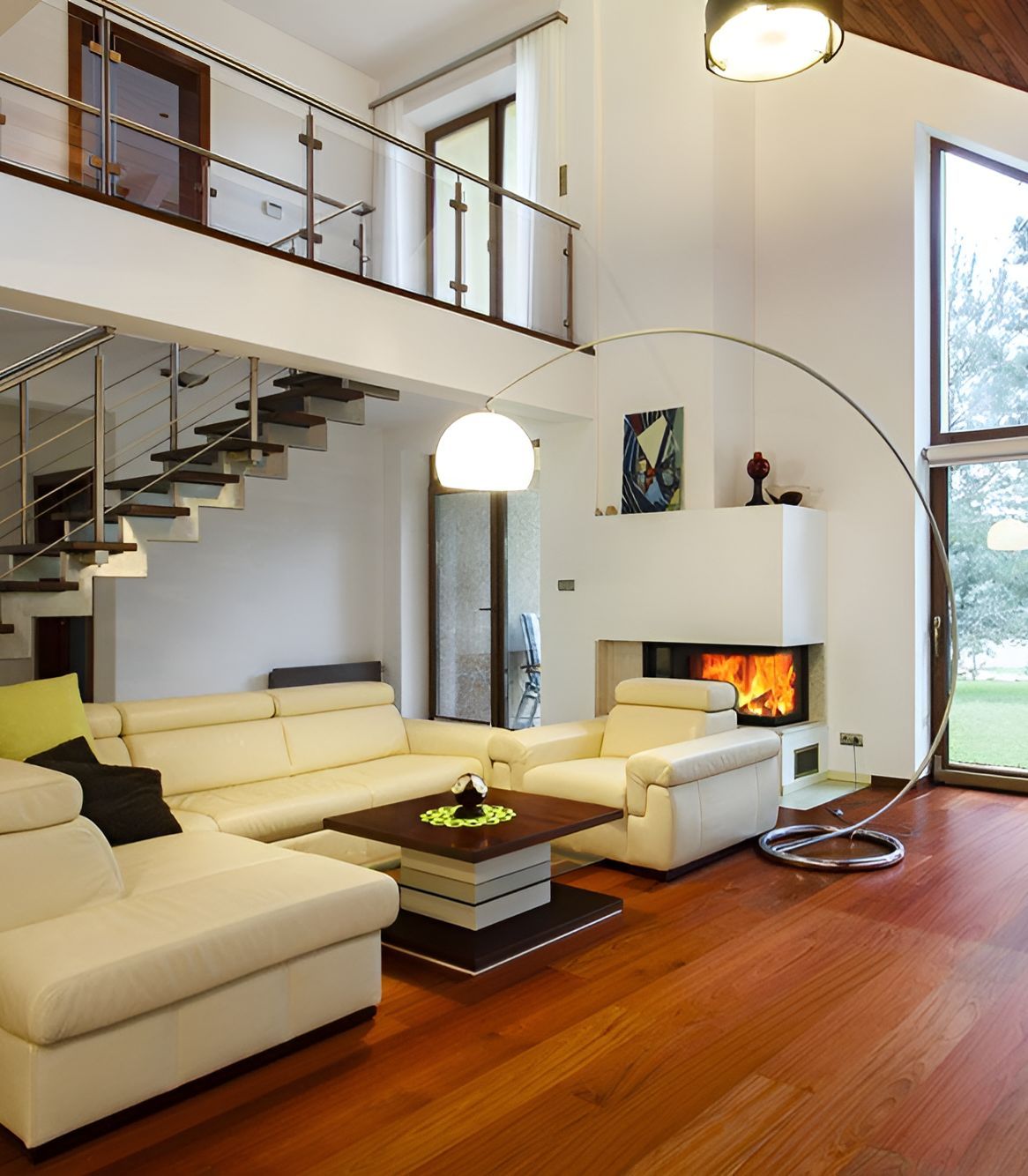 A Living Room With White Furniture And A Fireplace — Anytime Conveyancing In Wingham, NSW