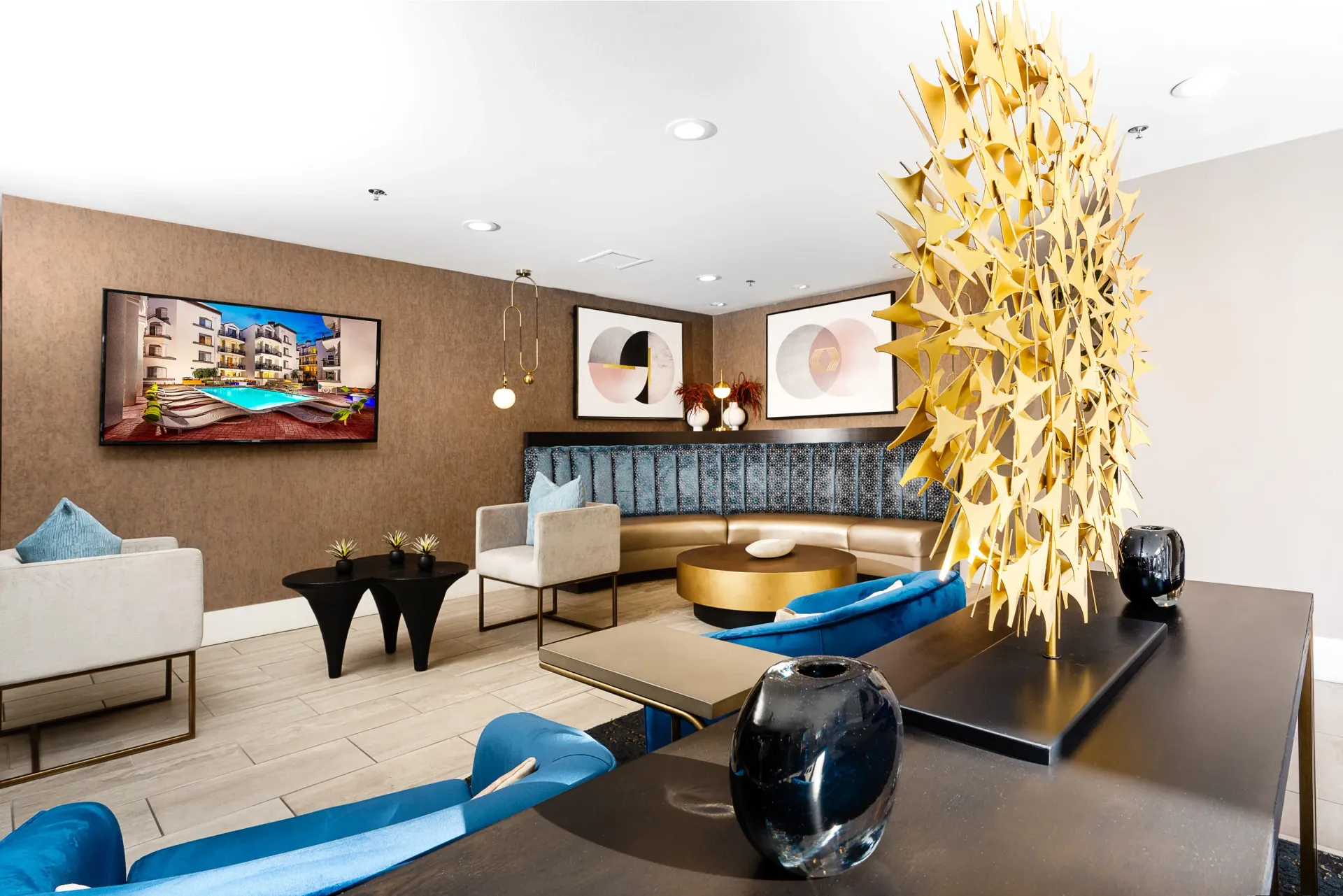 Lobby lounge area with modern seating and abstract art