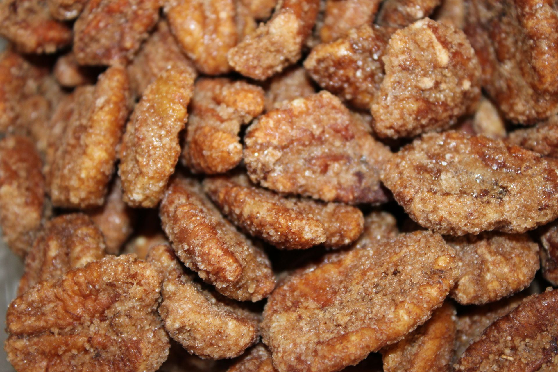 Close-up of crispy breaded chicken strips piled together, golden brown and textured