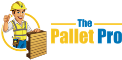 A man in a hard hat is holding a wooden pallet and giving a thumbs up.