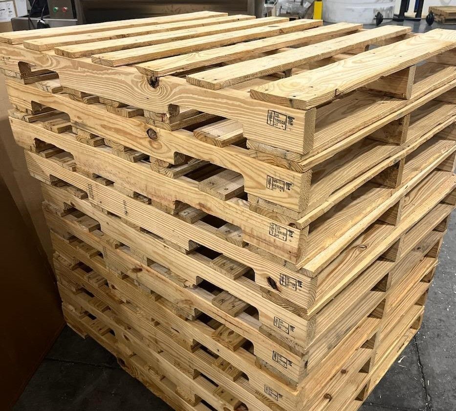 Stack of wooden pallets in a warehouse